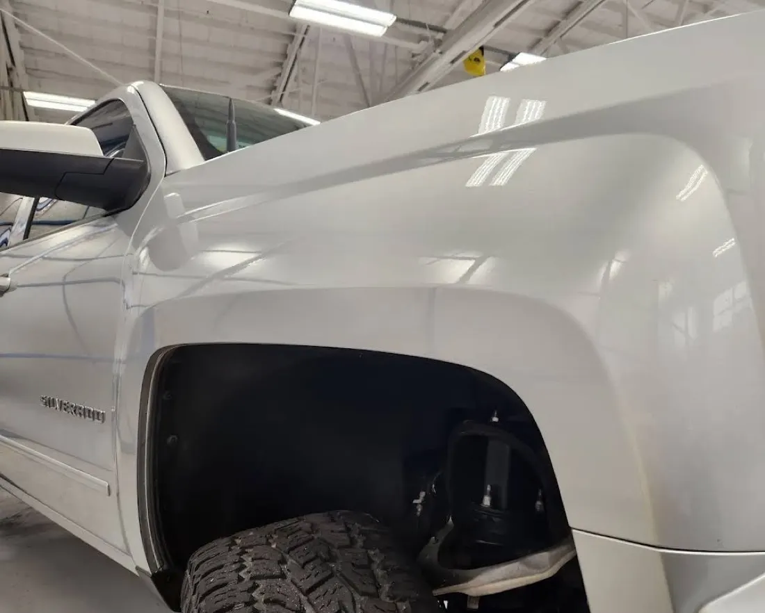 Sharp crease dent removed with advanced paintless dent repair in Apache Junction, AZ, after
